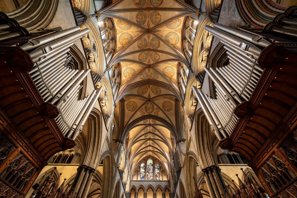 Wide view of the nave ceiling and organ pipes