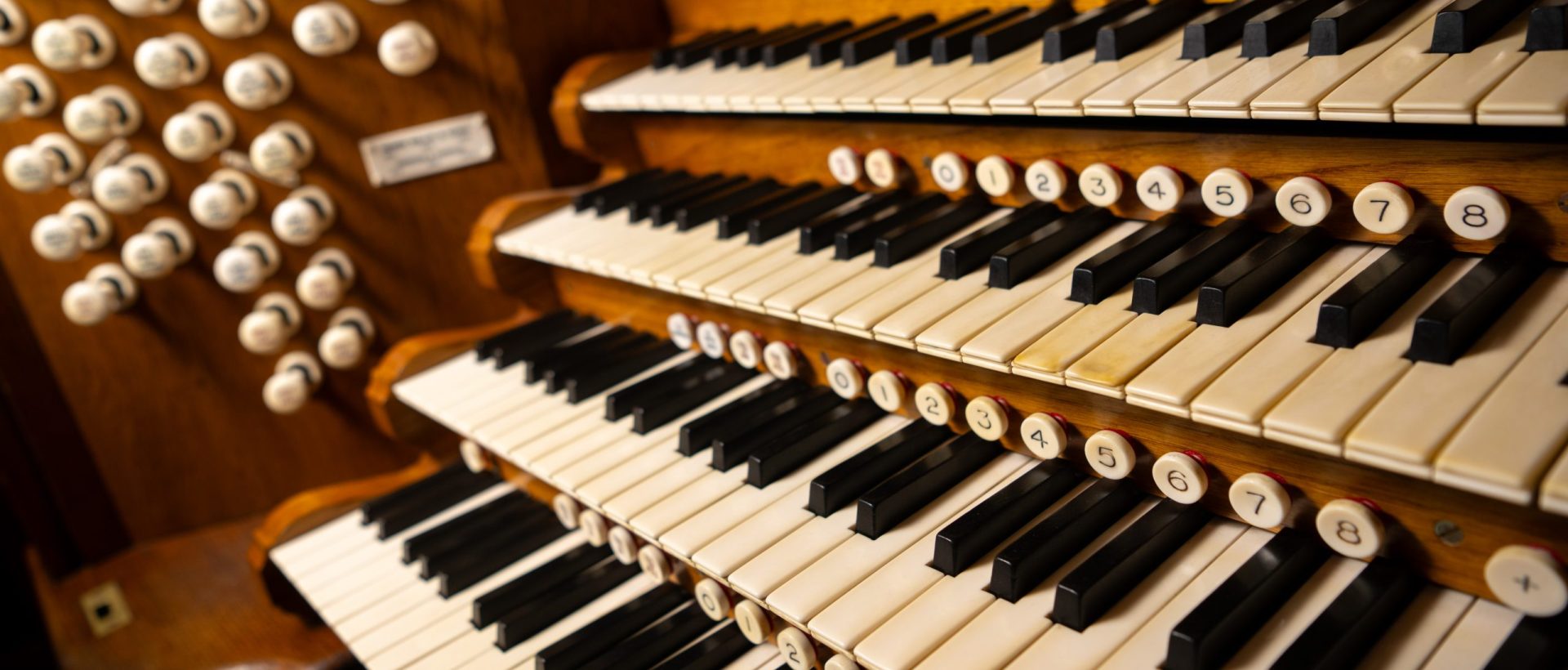 Photo shows details of the organ console
